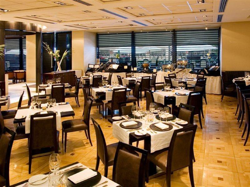 ホテル リーガル パシフィック プエルト マデロ ブエノスアイレス エクステリア 写真 The interior of the restaurant