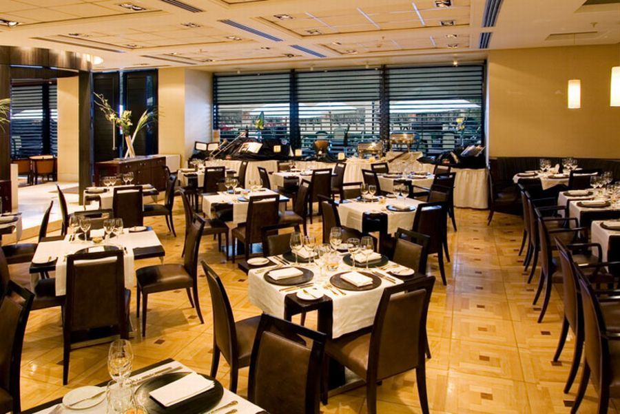 ホテル リーガル パシフィック プエルト マデロ ブエノスアイレス エクステリア 写真 The interior of the restaurant